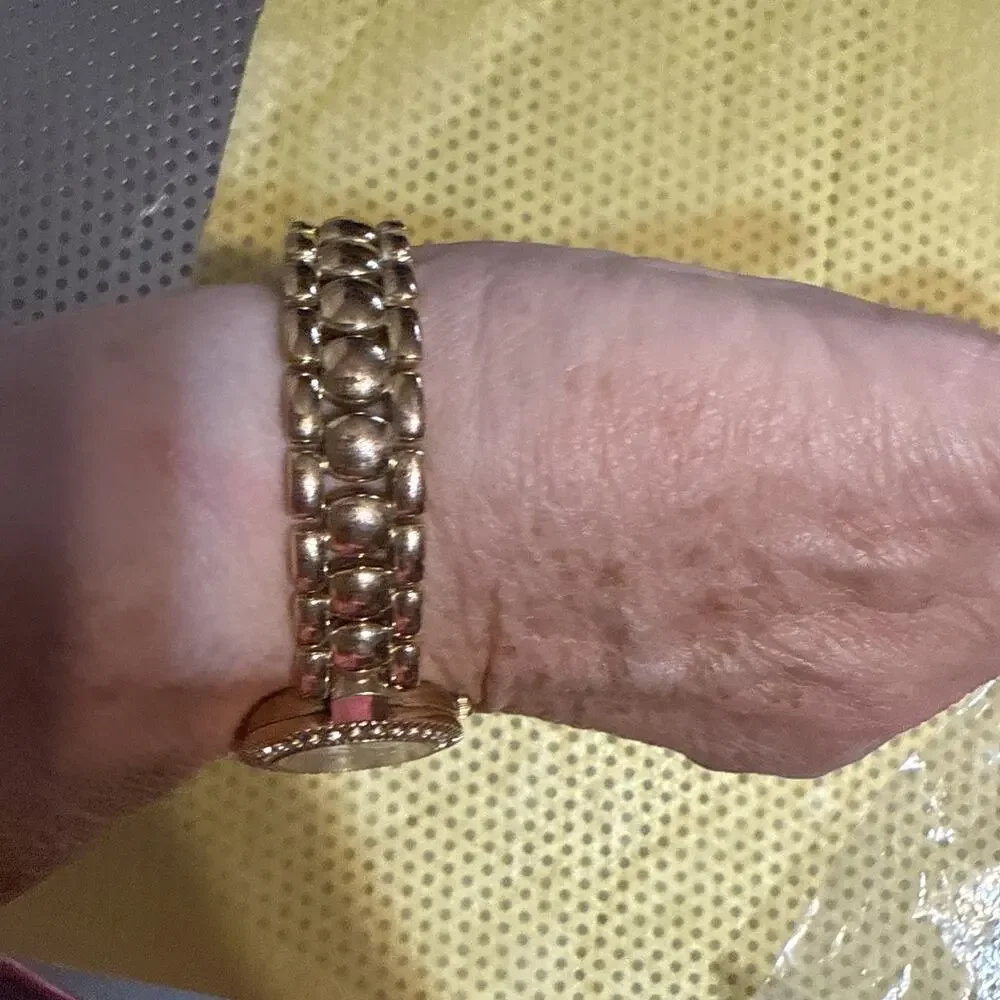 Gossip gold tone